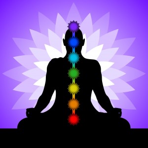 Yogi with chakras. Silhouette of man in lotus position.